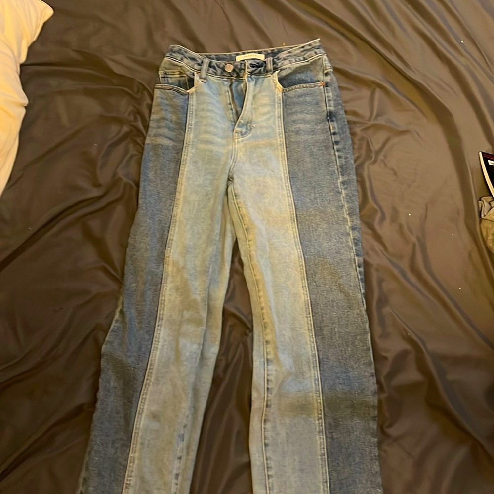 These split colored jeans make any outfit pop!